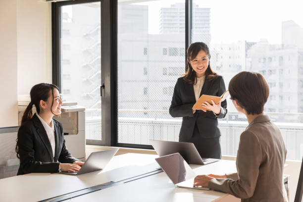 istock asian businesswomen working in office 941997572