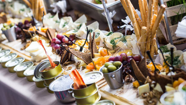 istock holiday buffet table served by different canape, sandwiches, snacks ready for eating in restaurant 941998138