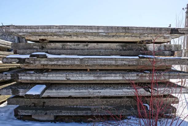 istock old gray concrete slabs in a pile in the snow 941998224