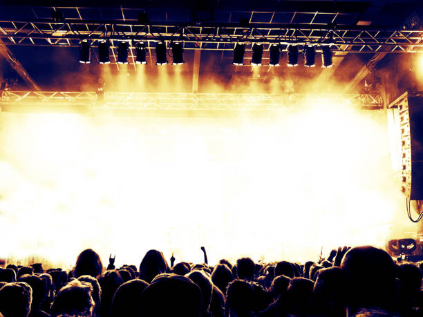 istock Concert stage in a crowded venue 942005160