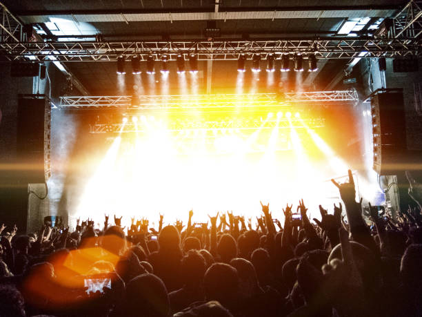 istock Concert stage in a crowded venue 942005182
