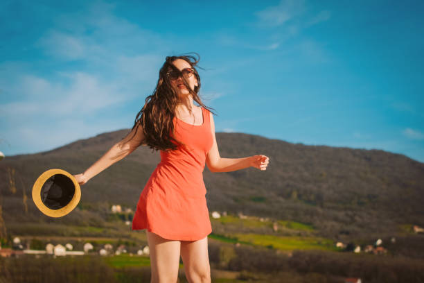 istock A beautiful woman walking around a mountainside 942016484