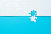 Blue background made from jigsaw puzzle
