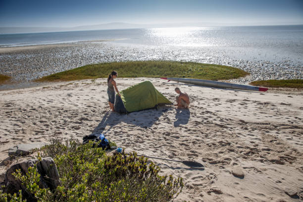 istock Young couple camping in the wilderness 942048984