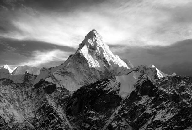 Mount Ama Dablam within clouds stock photo