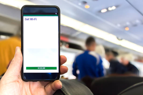 istock Smartphone connected to WI FI by an airline wifi application. 942114614