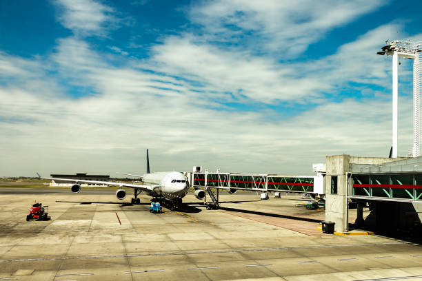 A jet airplane at the jetway finger, ready for pushback at Ministro Pistarini Ezeiza International Airport in Buenos Aires, Argentina.