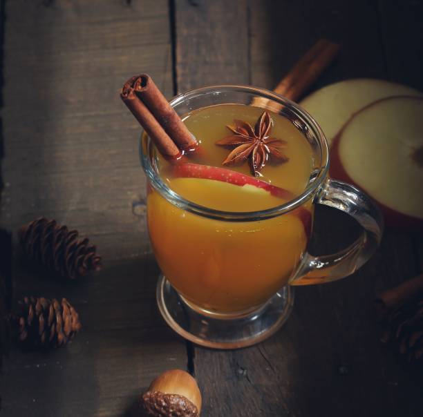 istock Homemade Apple Cider  in rustic wooden background, selective focus 942116518