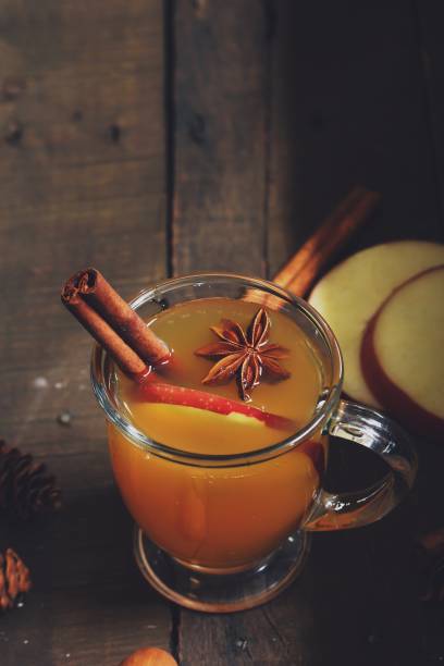 istock Homemade Apple Cider  in rustic wooden background, selective focus 942117072