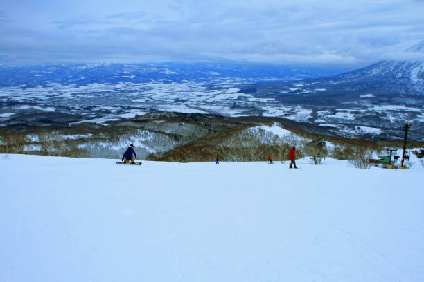 istock Ski resort, people enjoying skiing 942119294