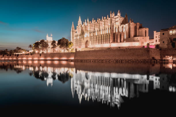La Seu Cathedral, Cathedral of Santa Maria of Palma at Night. Palma Majorca - Palma de Mallorca, Balearic Islands, Catalonia, Spain - Edited, stylized and desaturated colors.
