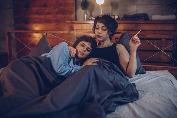 istock Girls lying in bed 942127782