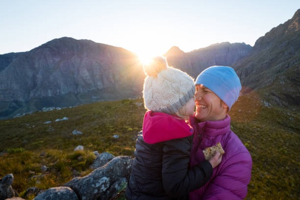 istock Mother and daughter bonding in nature 942131954
