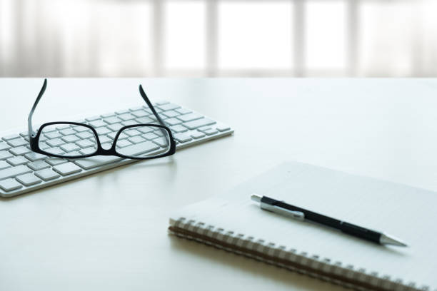 istock Close up of glasses and computer  business workplace work place in office 942134168