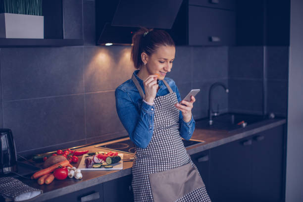 istock Woman checking recipes online 942136332