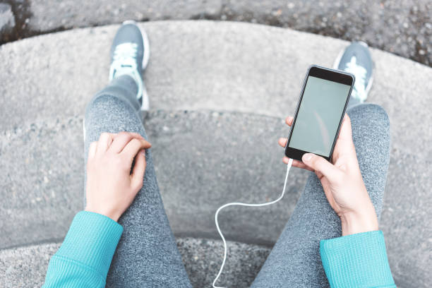 istock Woman with mobile phone, sport and workout 942136374