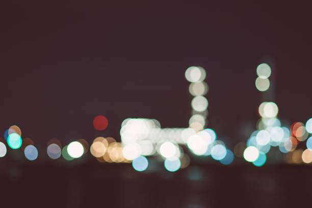 istock Urban city night light bokeh , defocused blur background 942136630