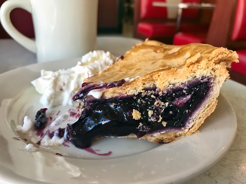 Blueberry pie on a diner table
