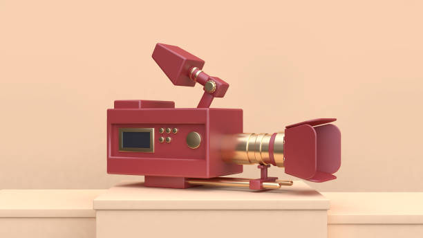 istock movie-cinema camera red gold set on cream scene 3d rendering 942141024