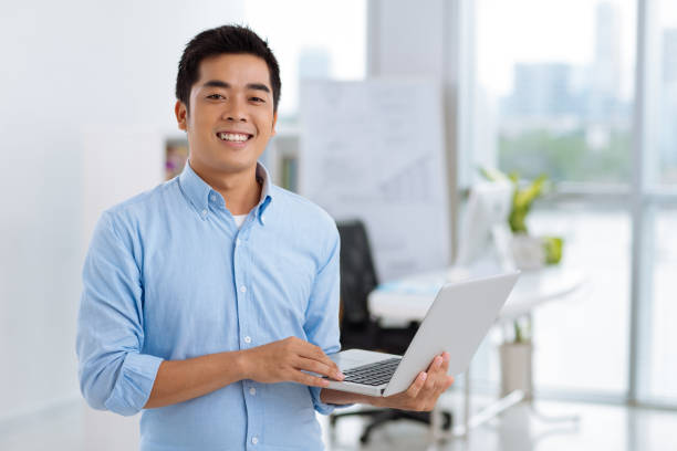 istock Joyful Manager Posing for Photography 942141540