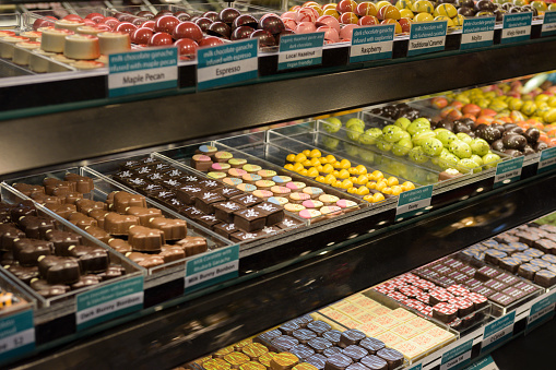 A variety of colorful and creative confections at a public market.