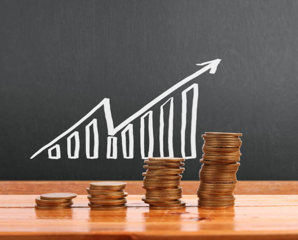 istock graph coins stock finance  business concept 942148640