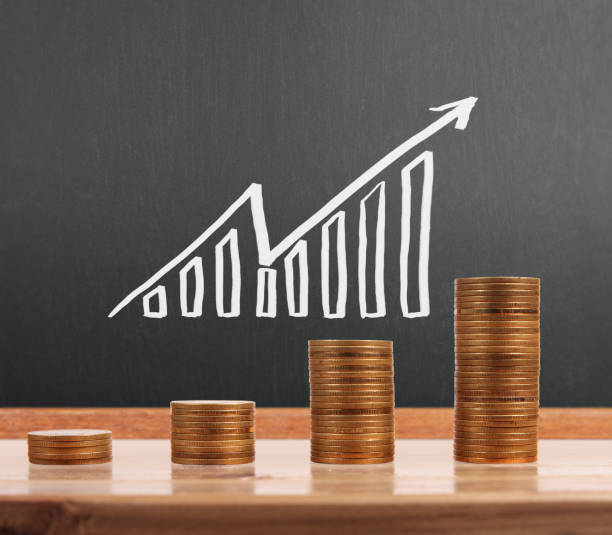 istock graph coins stock finance  business concept 942148642