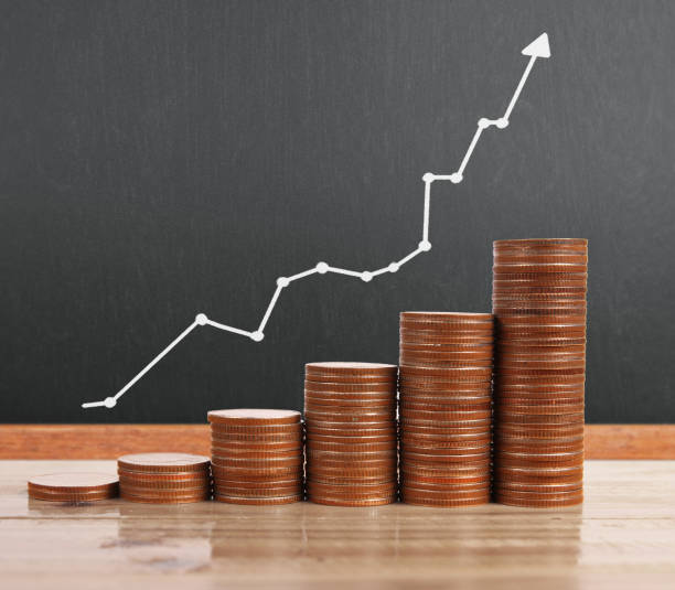 istock graph coins stock finance  business concept 942148660