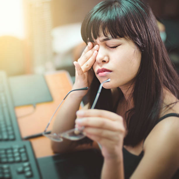 istock Young woman with aching eyes after working on computer. 942153936