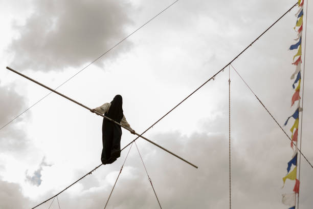 Slackline - man walking the line
