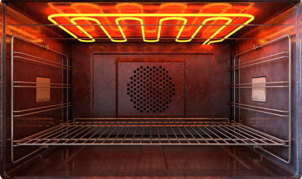 oven new outside view door open An upclose view through the front of the inside of an empty hot operational household oven with a glowing element and metal rack - 3D render oven door stock pictures, royalty-free photos & images