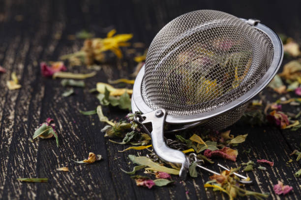 istock Dry herblal tea lay on wooden table 942156642