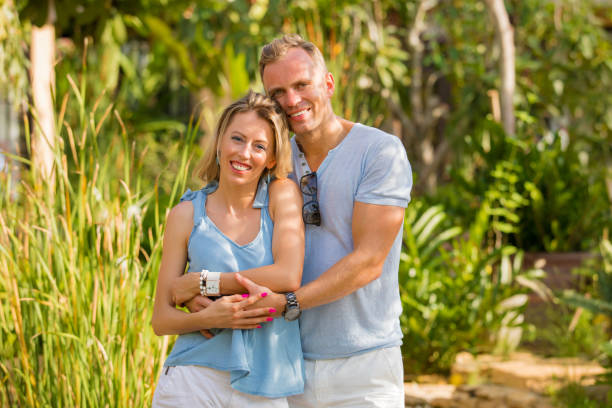 istock Natural looking happy couple embraced 942157874