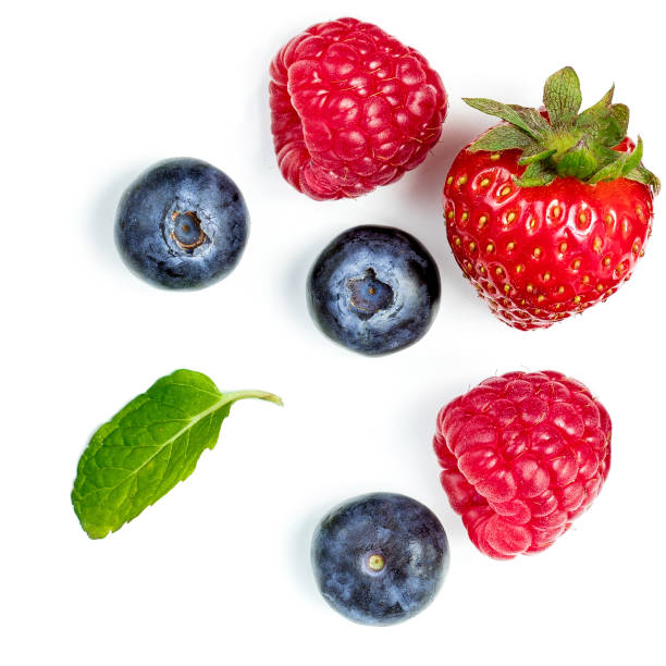 istock Fresh berries isolated on white background, top view. Strawberry, Raspberry, Blueberry and Mint leaf, flat lay