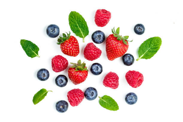 istock Fresh berries isolated on white background, top view. Strawberry, Raspberry, Blueberry and Mint leaf, flat lay