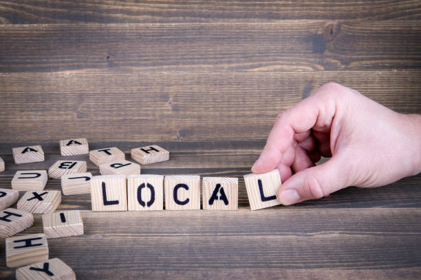 istock Local. Wooden letters on the office desk 942159146