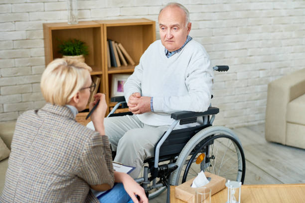istock Handicapped Senior Man in Therapy 942161502