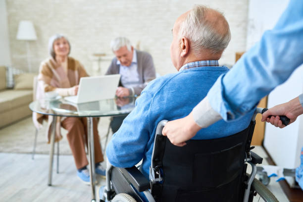 istock Handicapped Man in Retirement Home 942161510