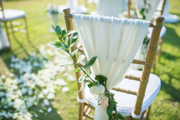 Wedding chair decorated with flowers.