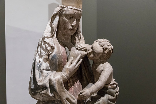 Medieval gothic statue of a Nursing Madonna, an iconography of the Madonna and Child in which the Virgin Mary is shown breastfeeding the infant Jesus. Convent of Christ, Tomar, Portugal