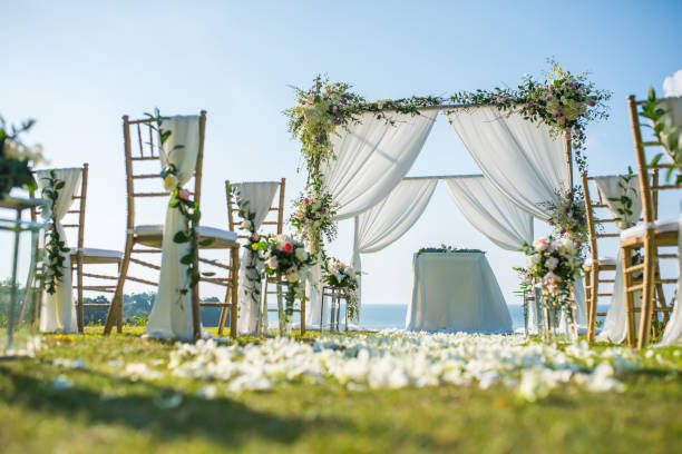 istock Romantic wedding ceremony on the lawn Sea view. 942165008