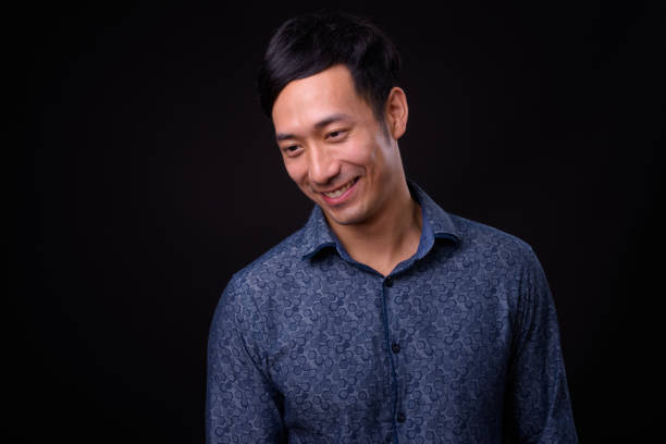 istock Portrait Of Handsome Asian Man Smiling 942166622