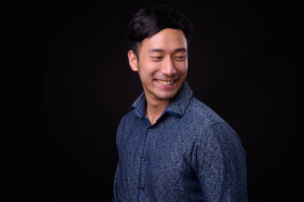 istock Portrait Of Handsome Asian Man Smiling 942166686