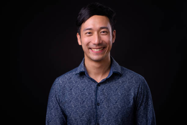 istock Portrait Of Handsome Asian Man Smiling 942166688