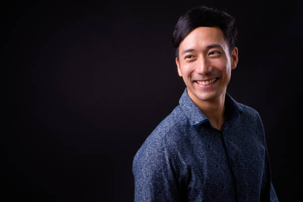 istock Portrait Of Handsome Asian Man Smiling 942166784