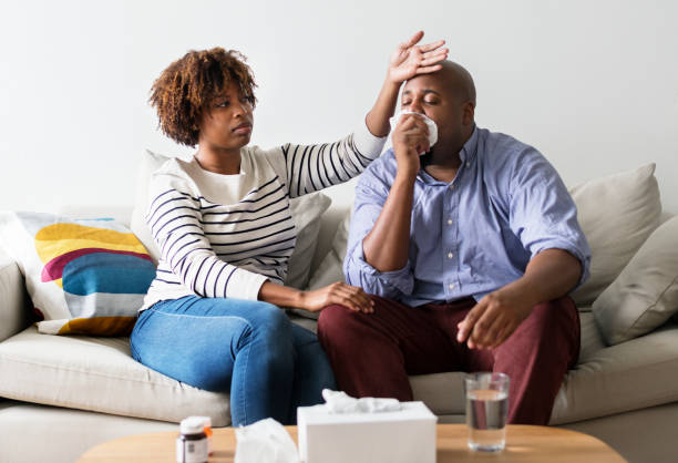 istock Couple sick at home on the sofa 942166794