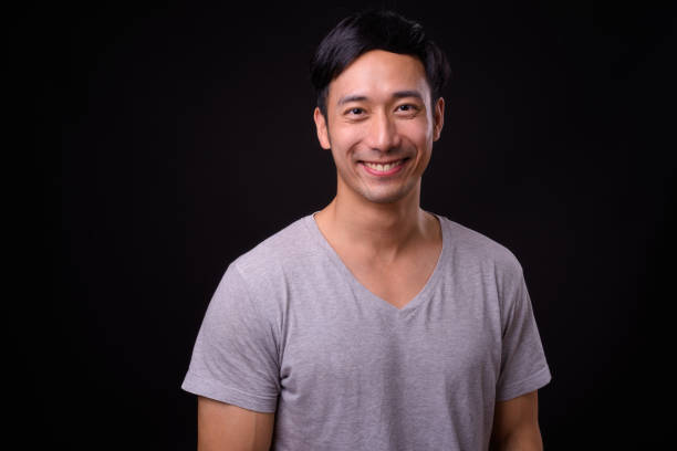 istock Portrait Of Handsome Asian Man Smiling 942167664