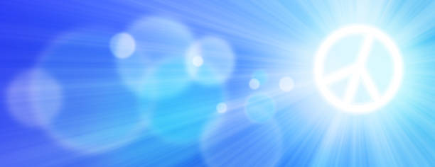 istock Sun is shining as a peace sign in the sky with sun rays and lens flare 942168716