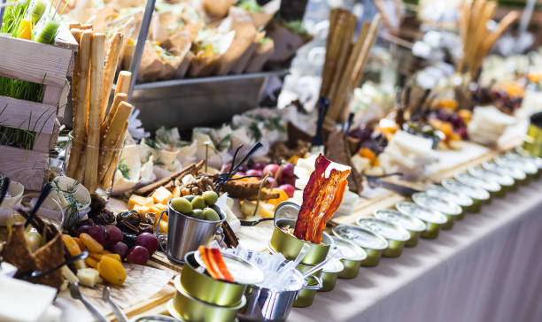 istock holiday buffet table served by different canape, sandwiches, snacks ready for eating in restaurant 942176694
