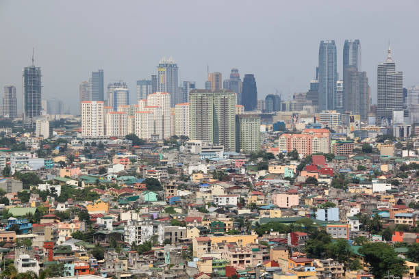istock Crowded Manila Cityscape on a polluted day 942177474